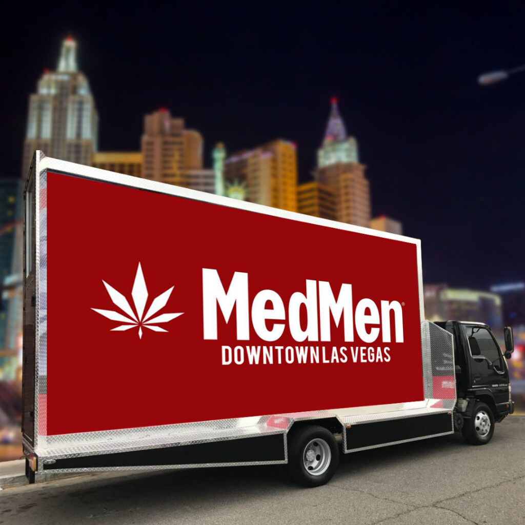 A truck with a MedMen logo on it.